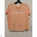 Top Short Sleeve By Reebok In Peach, Size: L